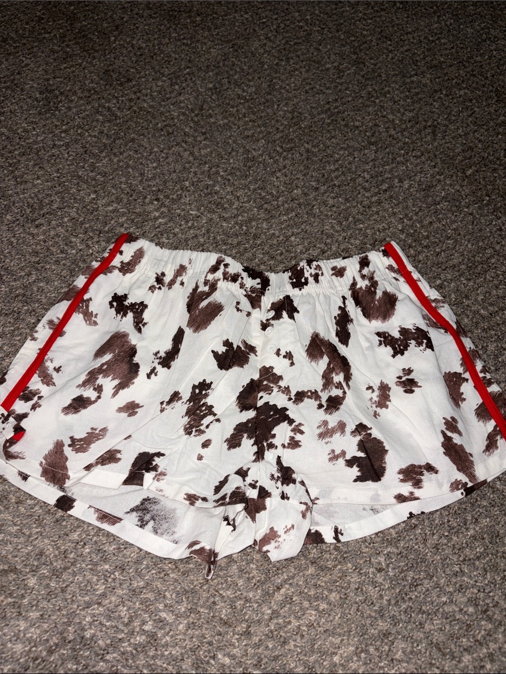 Zoe + Liv White Cow-Print Athletic Shorts with Red Trim